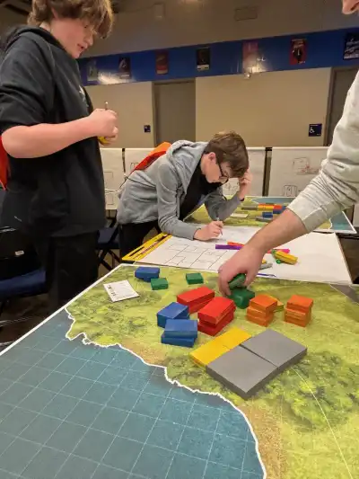 Image of a student working at a table